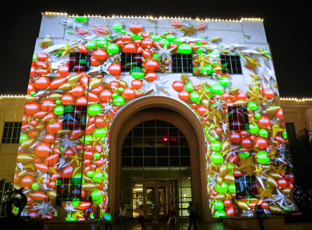 Colorful and cheerful Christmas decoration light being displayed upon the front façade of city hall for Merry Winter Garden Light Show