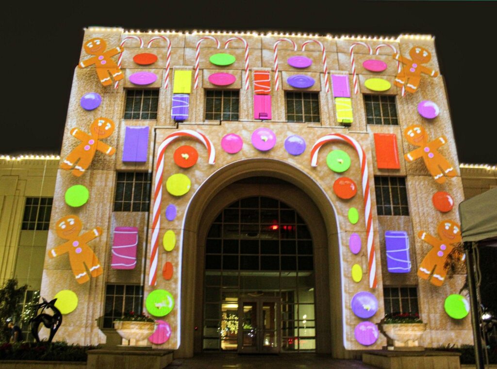 Colorful and cheerful Christmas decoration light being displayed upon the front façade of city hall for Merry Winter Garden Light Show