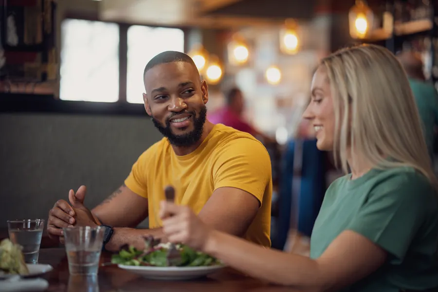 Couple enjoying a meal at a downtown restaurant