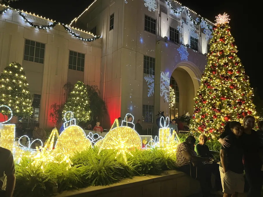 Winter Garden City Hall lit up with Christmas trees and lights