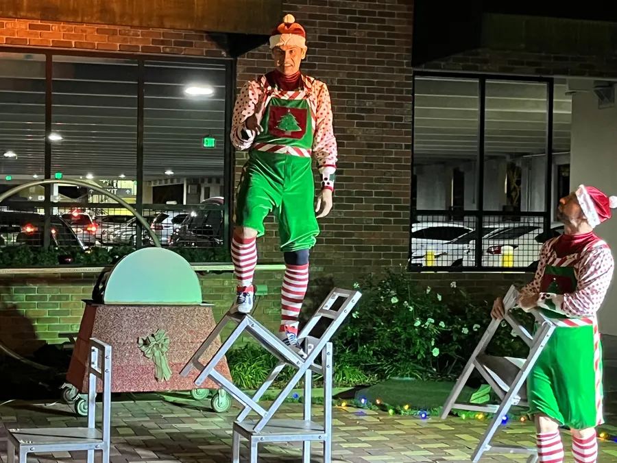 Holiday elf street performers downtown